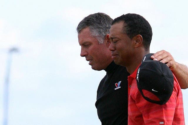 Tiger Woods (right) will not be fit to contest next month’s Open Championship (Peter Byrne/PA)