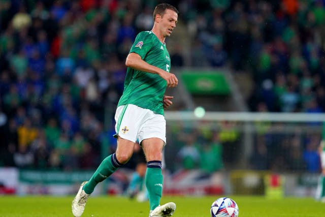 Jonny Evans, who has played 100 times for Northern Ireland, is to be made an MBE (Brian Lawless/PA)