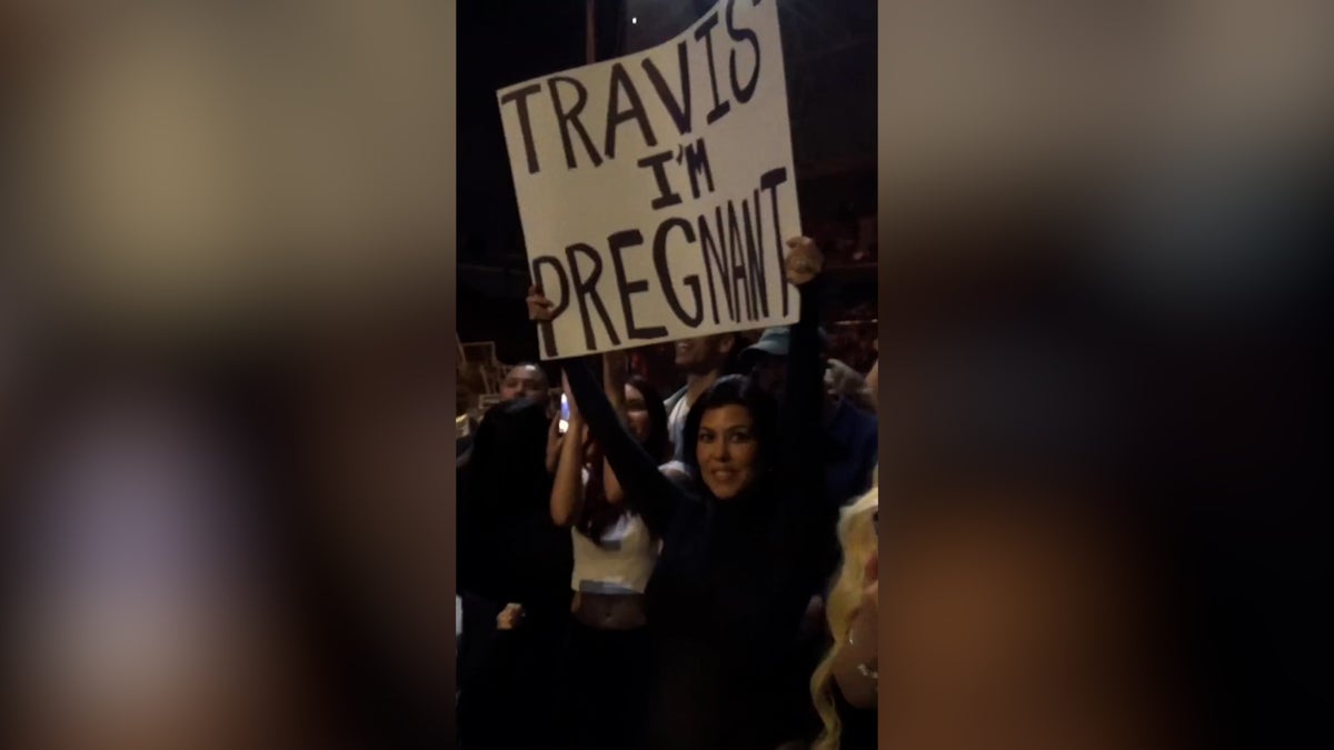 Kourtney Kardashian announces pregnancy at Blink-182 concert after documenting painful IVF journey