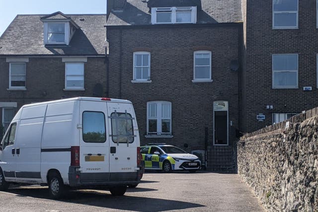 A police car parked outside a house on Albion Place, Maidstone (Anahita Hossein-Pour/PA)