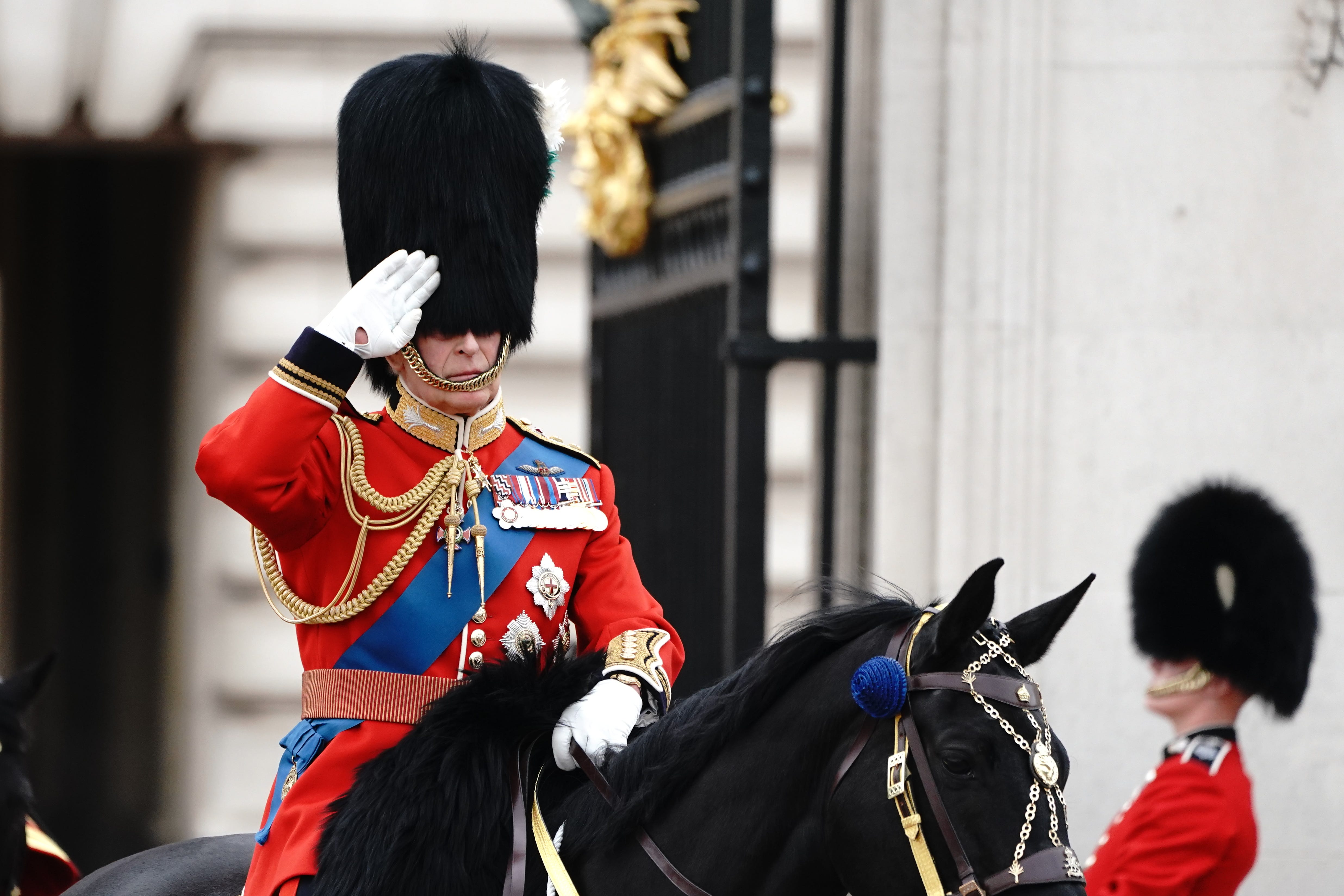 King takes part in first Trooping the Colour ceremony as monarch The