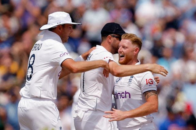 <p>Captain Ben Stokes took the wicket of Steve Smith while Stuart Broad (left) tooke two wickets </p>