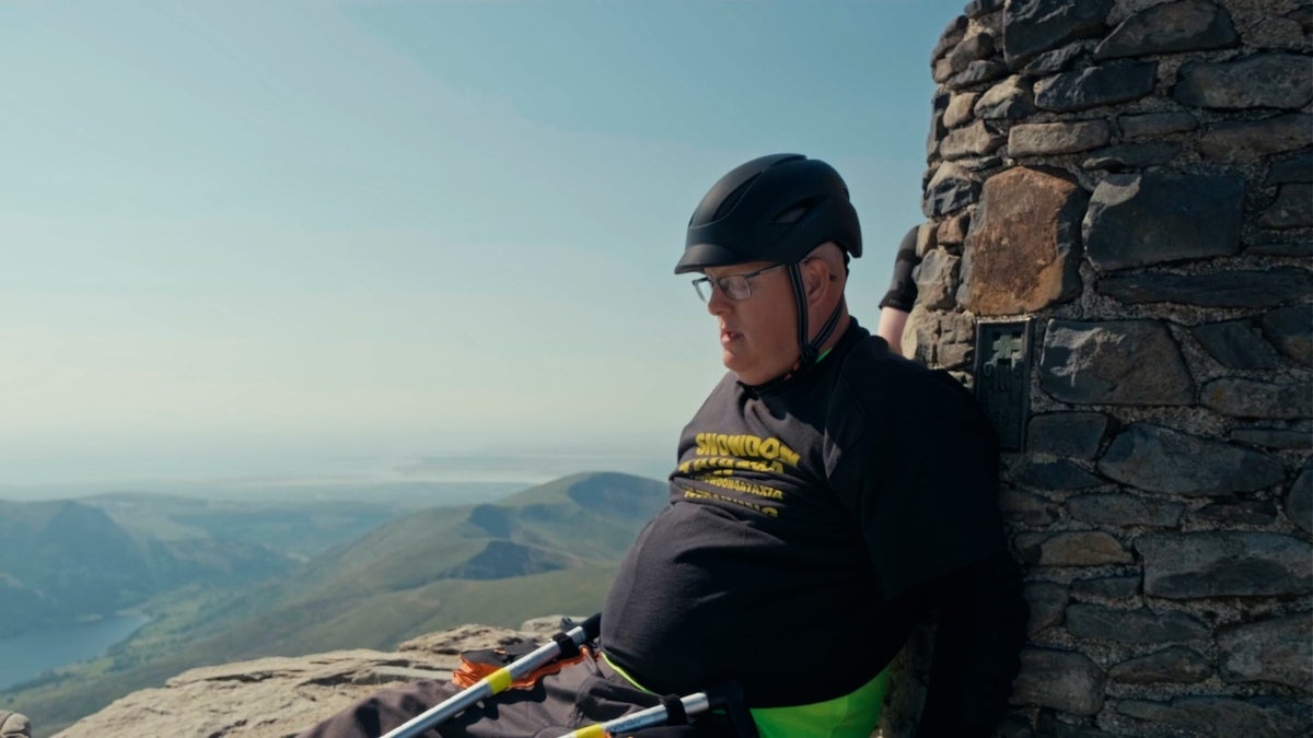 Wheelchair user completes Mount Snowdon climb to raise awareness for his neurological condition