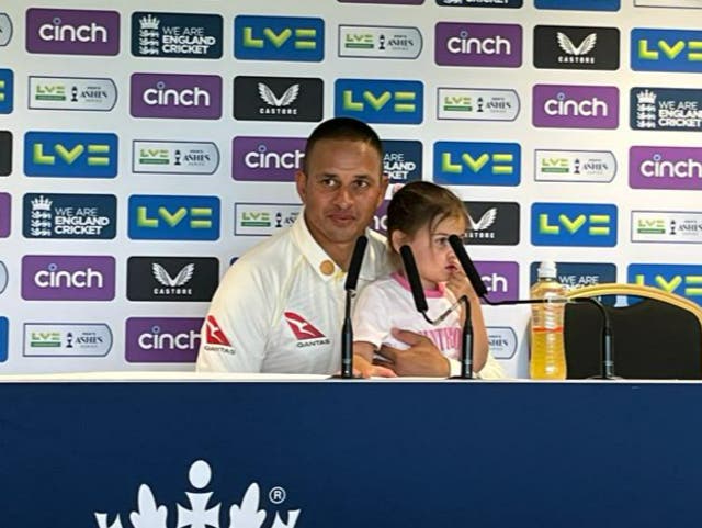 <p>Usman Khawaja brought his daughter into the post-play press conference </p>