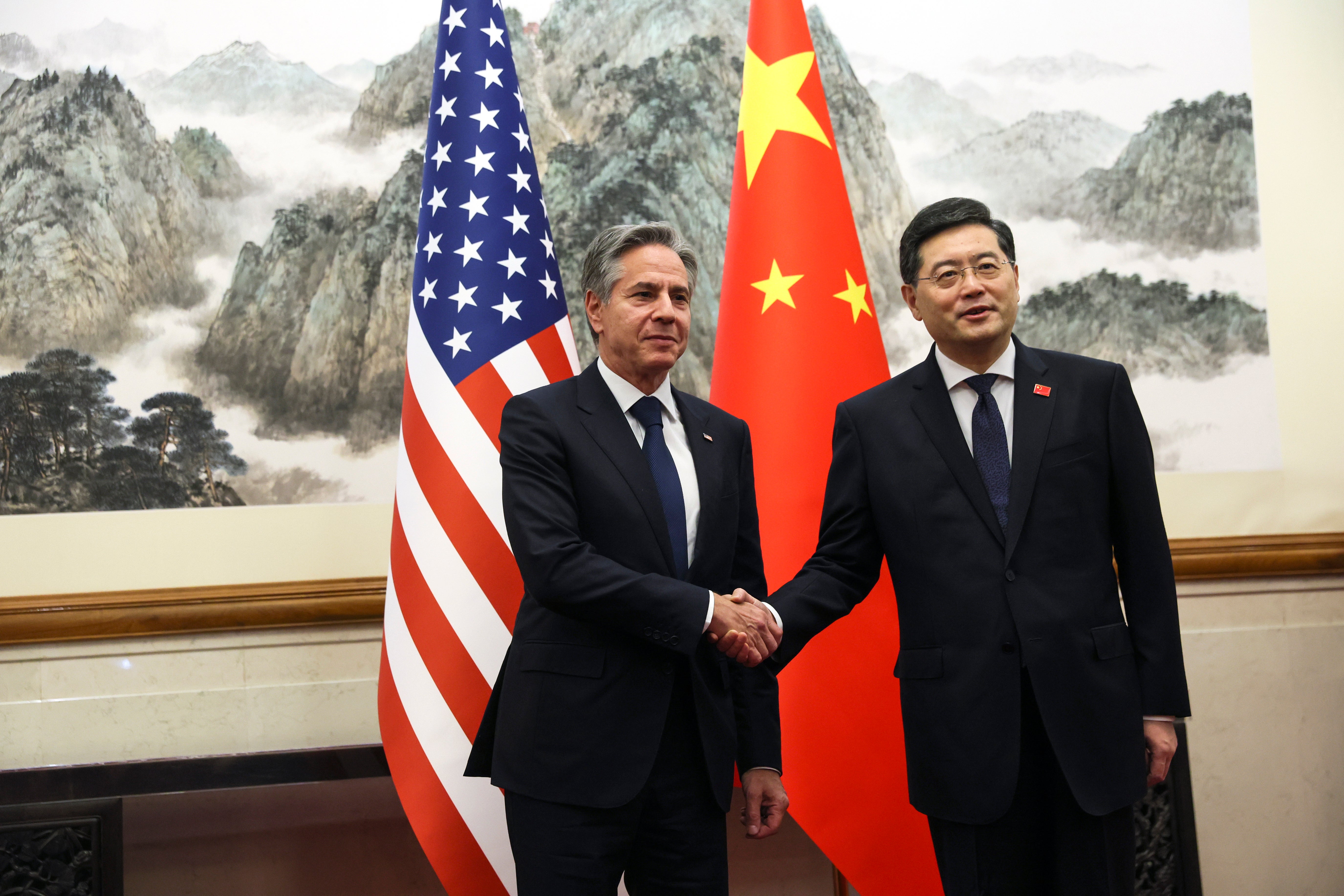 US secretary of state Antony Blinken, left, shakes hands with Chinese foreign minister Qin Gang, right, at the Diaoyutai State Guest house in Beijing, China on Sunday