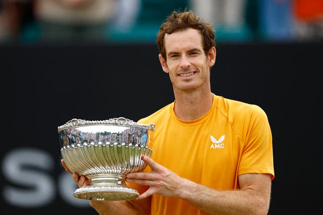 <p>Andy Murray celebrates with the Nottingham Open trophy</p>
