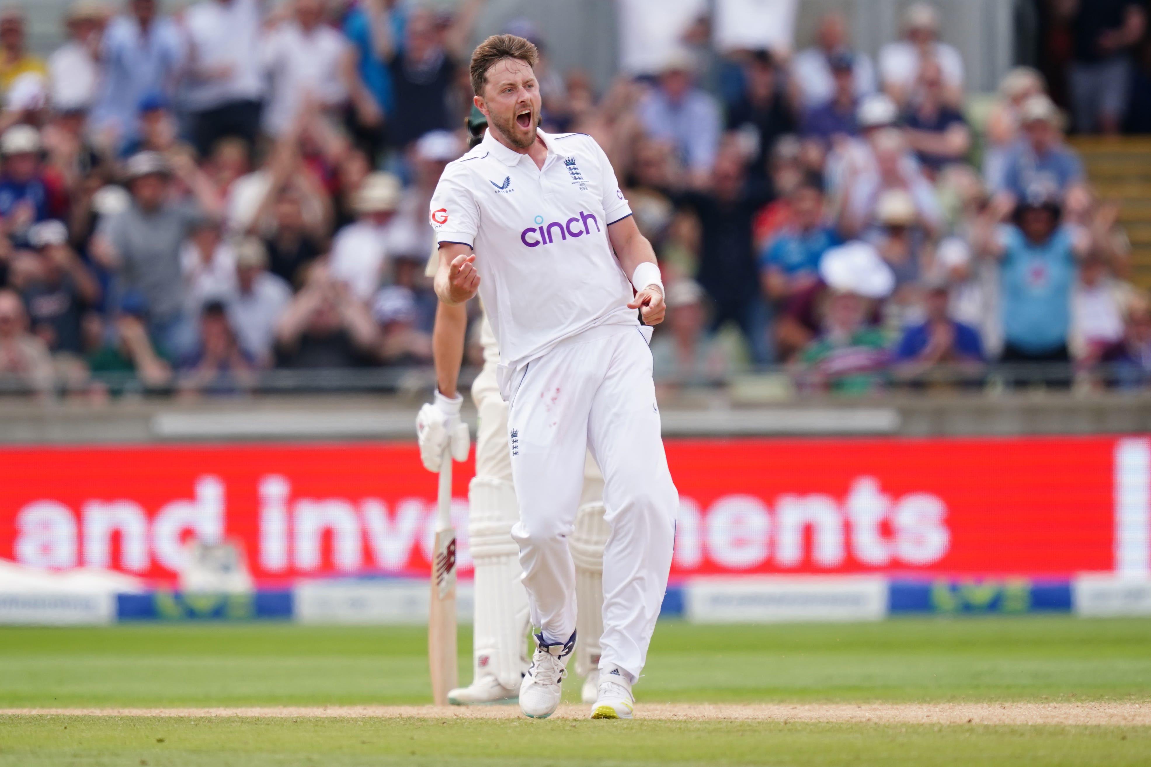 Ollie Robinson celebrates removing Australian centurion Usman Khawaja (David Davies/PA)