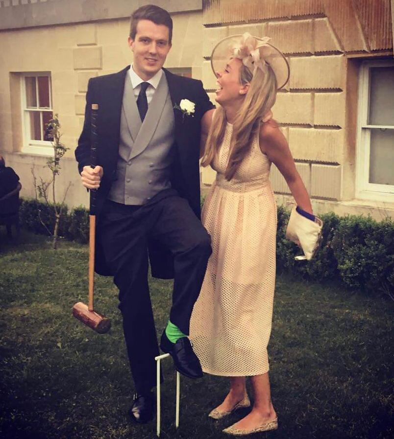 Carrie Johnson laughs with friend Ben Mallet, pictured with a croquet mallet, at a friend’s wedding in 2016