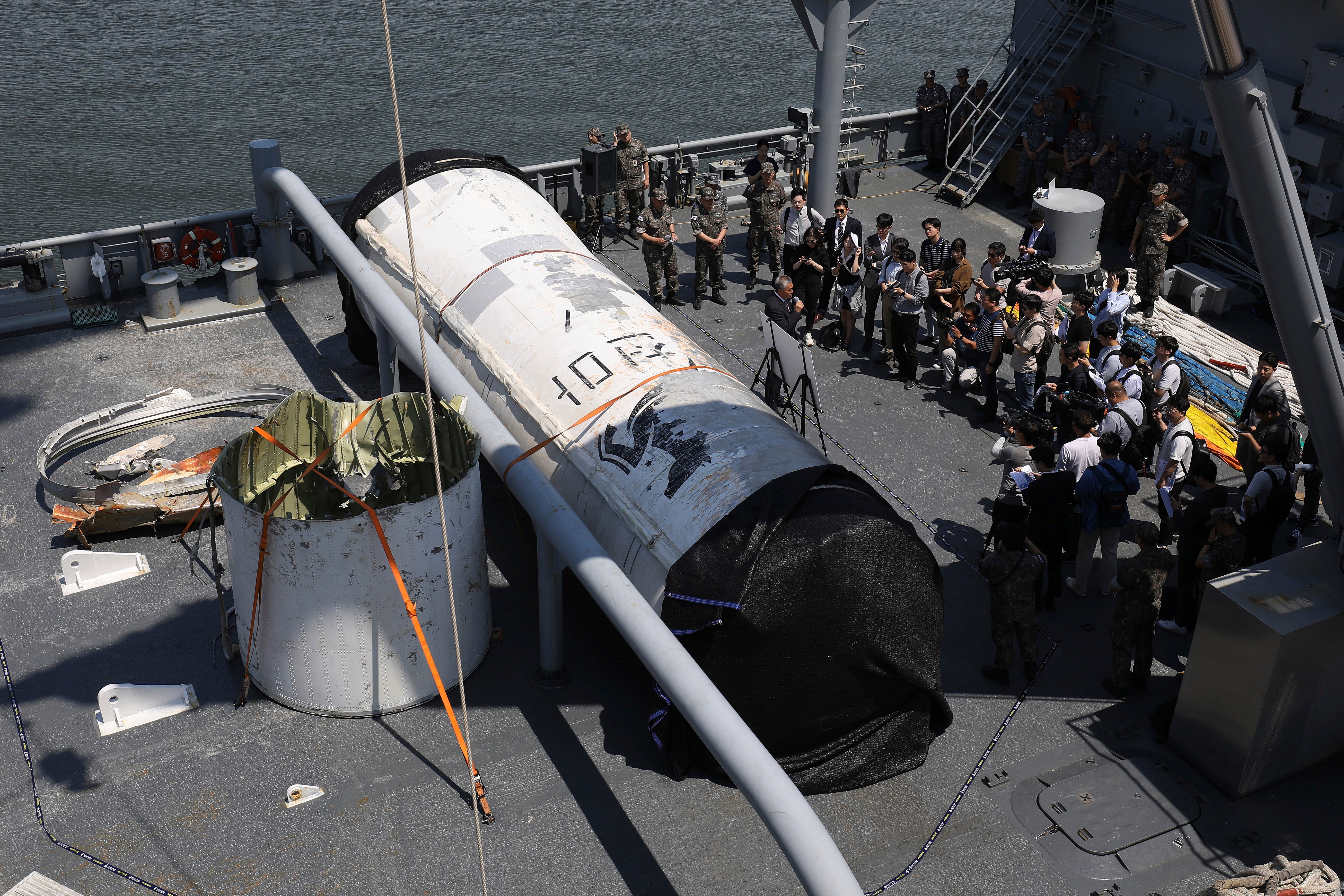 Objects salvaged by South Korea’s military that are presumed to be parts of the North Korean space-launch vehicle that crashed into sea following a launch failure, are displayed at the Navy's 2nd Fleet Command in Pyeongtaek, South Korea, Friday, 16 June 2023