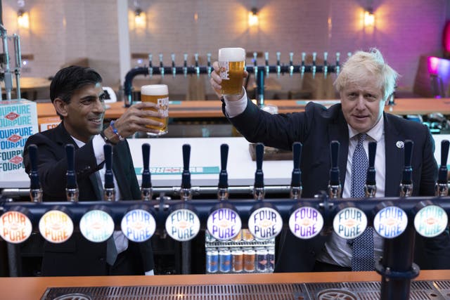 Prime Minister Boris Johnson (right) with Chancellor of the Exchequer Rishi Sunak during a visit to Fourpure Brewery in Bermondsay, London, after Sunak delivered his Budget to the House of Commons. Picture date: Wednesday October 27, 2021.