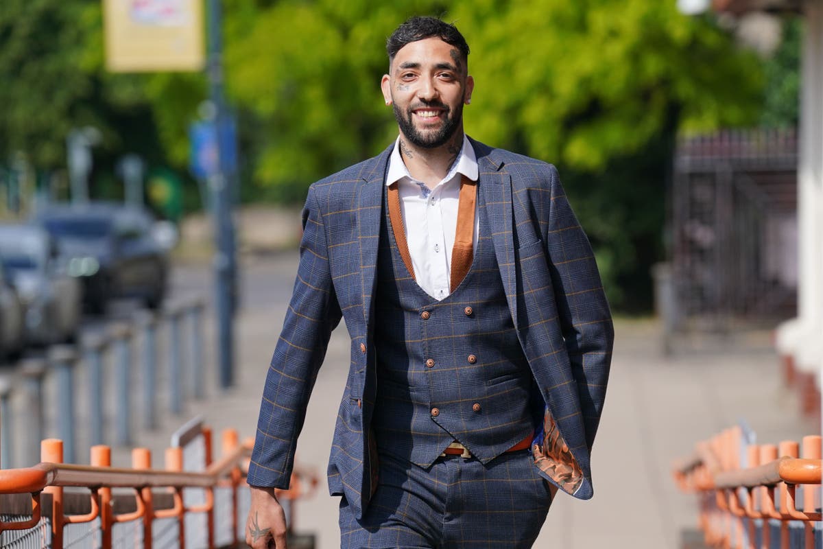 Man chuckles in court after receiving football ban for wearing offensive shirt