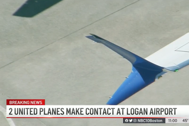 <p>Two planes make contact at Boston airport.</p>