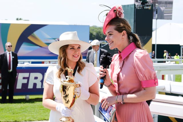 <p>The Kentucky Derby trophy made a popular appearance at this year’s Epsom event </p>
