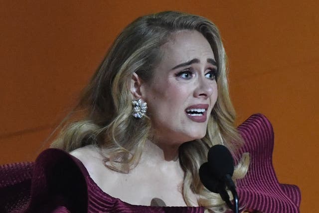 <p>Adele accepts the award for Best Pop Solo Performance for for "Easy on Me" during the 65th Annual Grammy Awards </p>