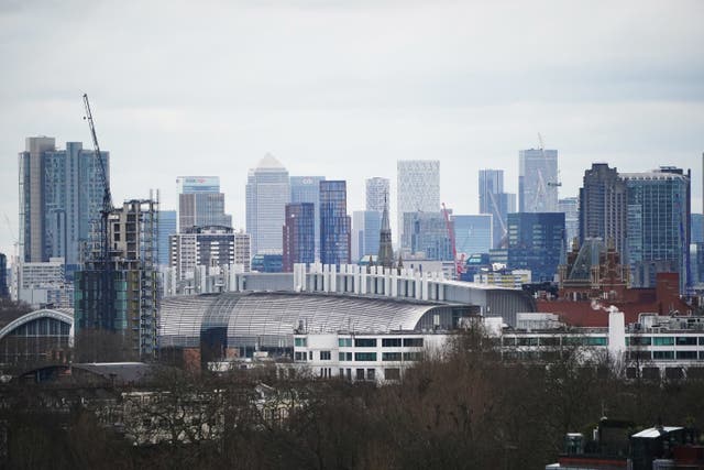The City of London and Canary Wharf as seen from Primrose Hill, London (Jonathan Brady/PA)