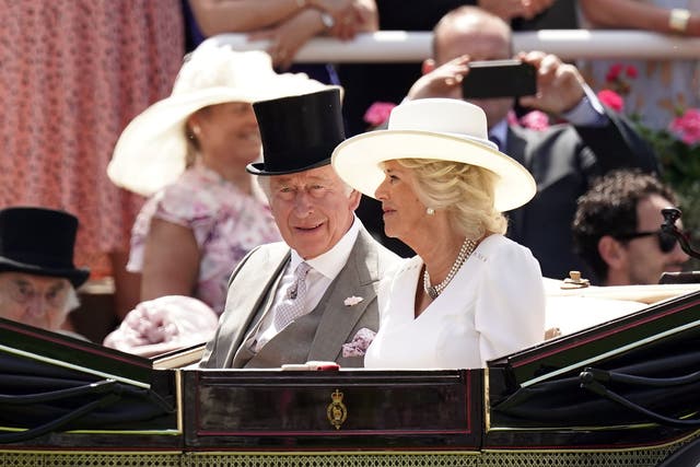 The King and Queen at Ascot last year (PA)