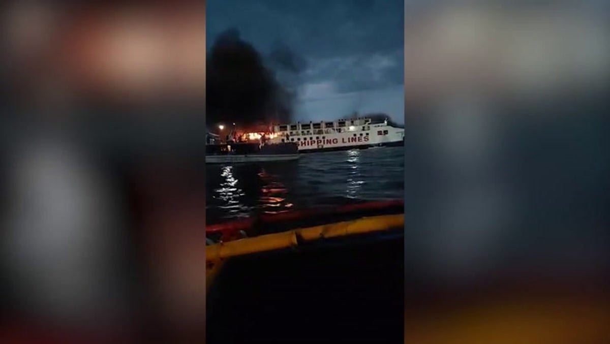 Ferry fire rages as coast guard rescues 120 passengers in the Philippines
