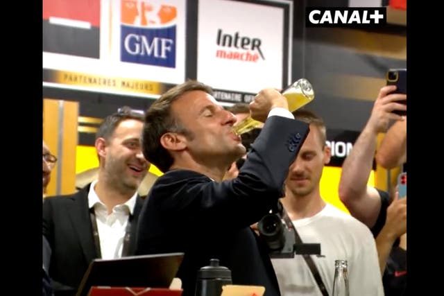 <p>Emmanuel Macron downs a beer in 17 seconds at a rugby club in France</p>