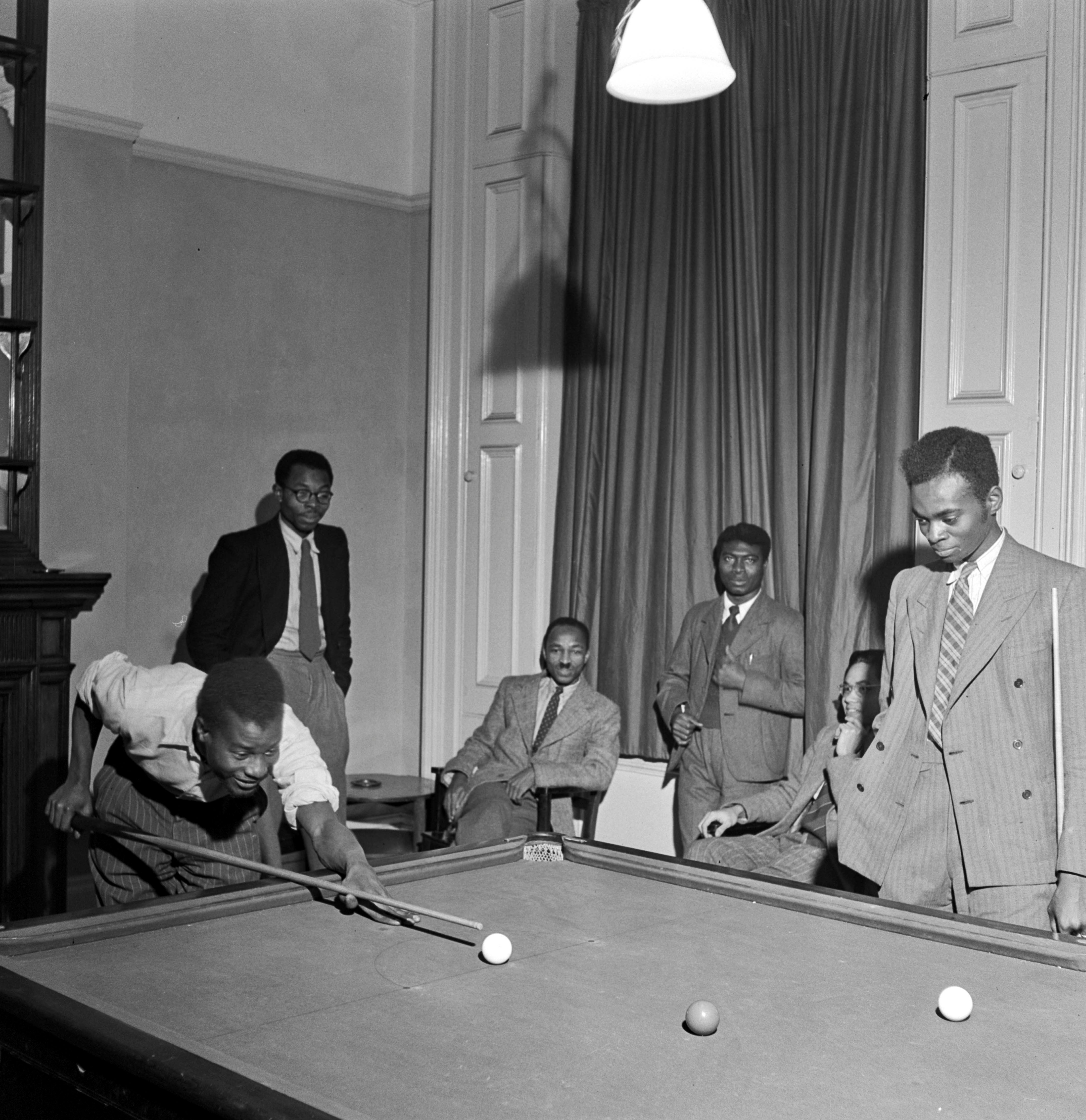 A group of men playing pool in London, 1948