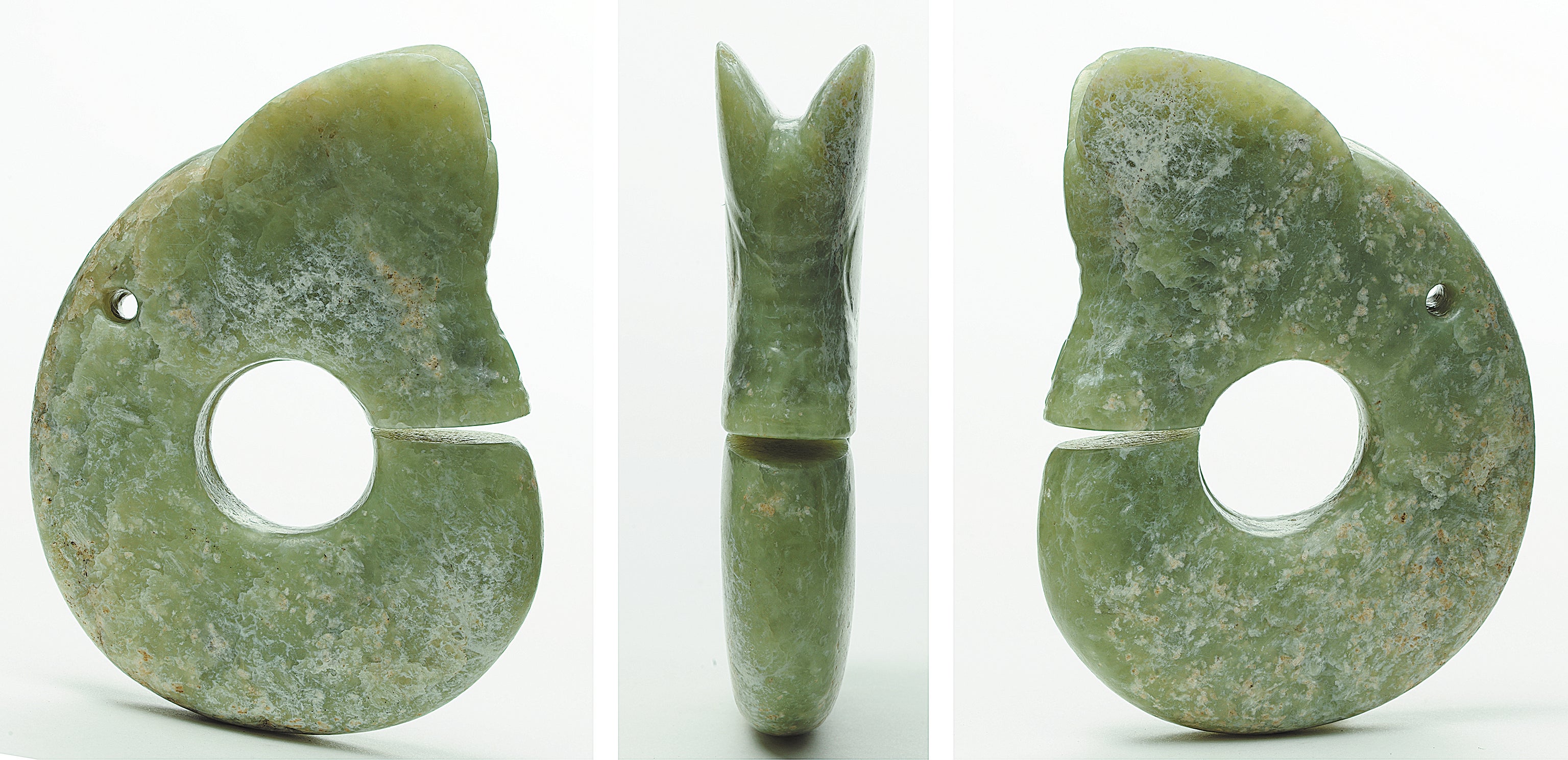A dragon-shaped jade item unearthed from Banlashan in Chaoyang city, Liaoning province. The site is one of the major archaeological findings of the Neolithic Hongshan Culture, which is renowned for its exquisite jades