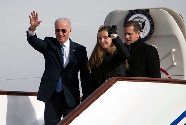 <p>Hunter Biden, right, stands next to his daughter Finnegan and his father Joe Biden.</p>