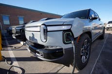 Electric vehicle maker Rivian to join Tesla charging network as automakers consider company's plug