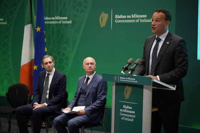 (left to right) Minister Simon Harris, vice-chancellor of Ulster University Professor Paul Bartholomew, and Taoiseach Leo Varadkar during the launch of a funding package for the Ulster University Magee Campus in Derry, as part of the Shared Island Fund, at the Government Buildings in Dublin (Niall Carson/PA)