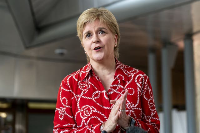 Nicola Sturgeon has returned to the Scottish Parliament for the first time since her arrest (Jane Barlow/PA)