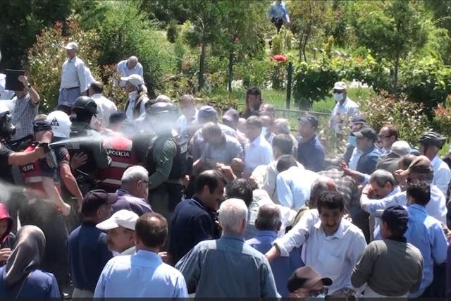 <p>Police in Albania deploy chemical sprays against a large crowd of unarmed members of the MEK at Ashraf III</p>