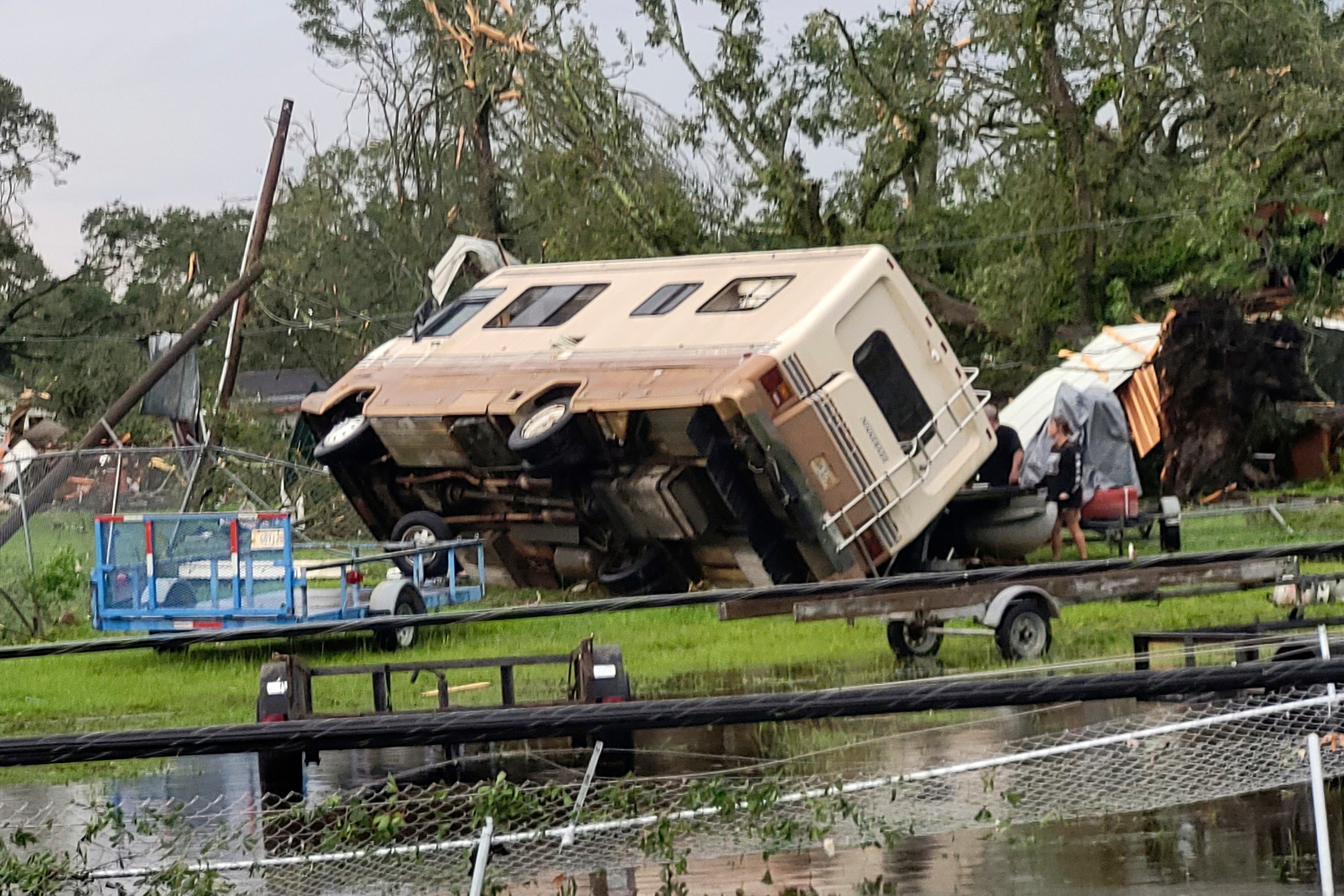 A mobile home is turned on its side off Main Street in Moss Point, Mississippi, after a tornado struck the town this month