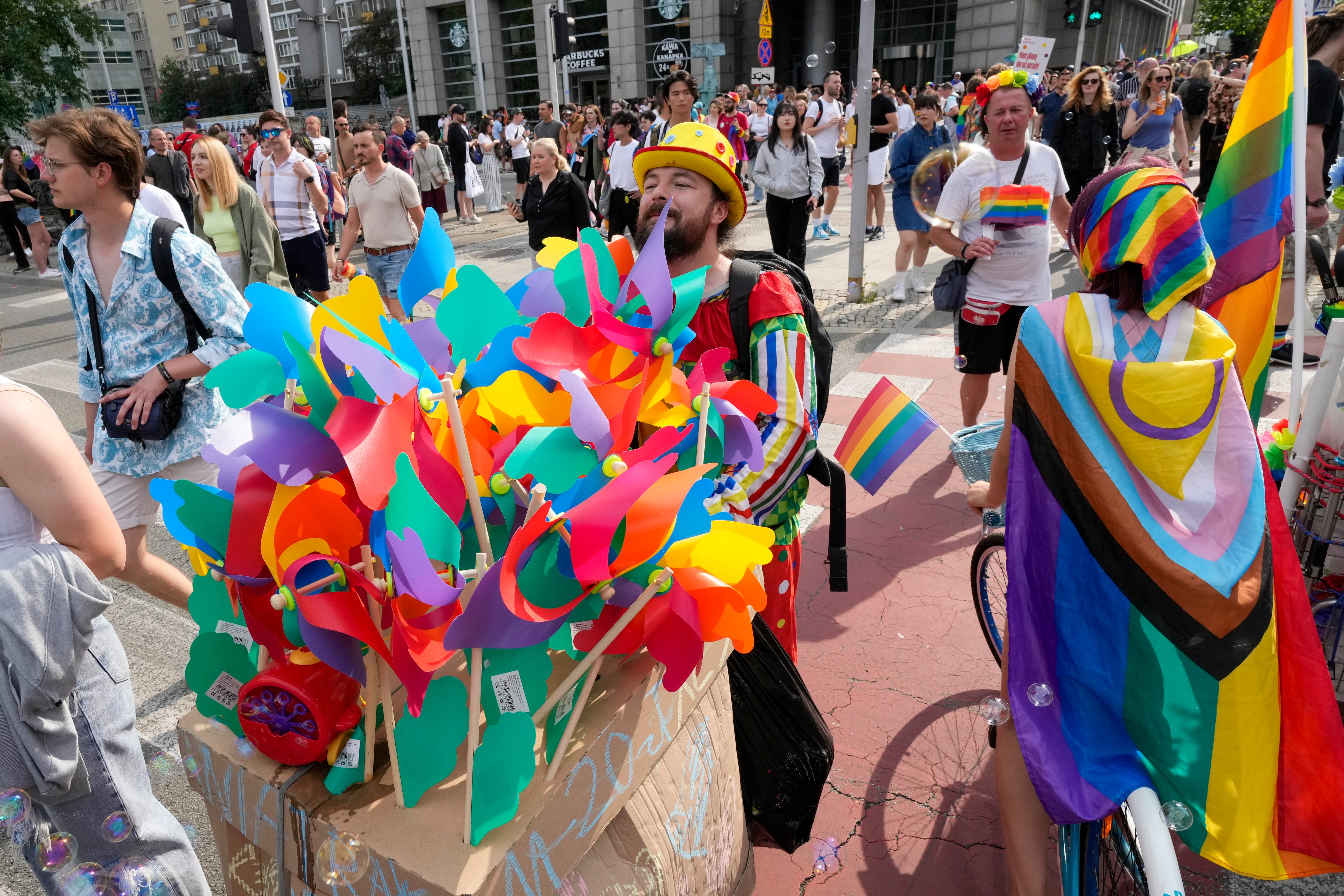 People take part in Poland’s yearly Pride parade, known as the Equality Parade, in Warsaw, Poland