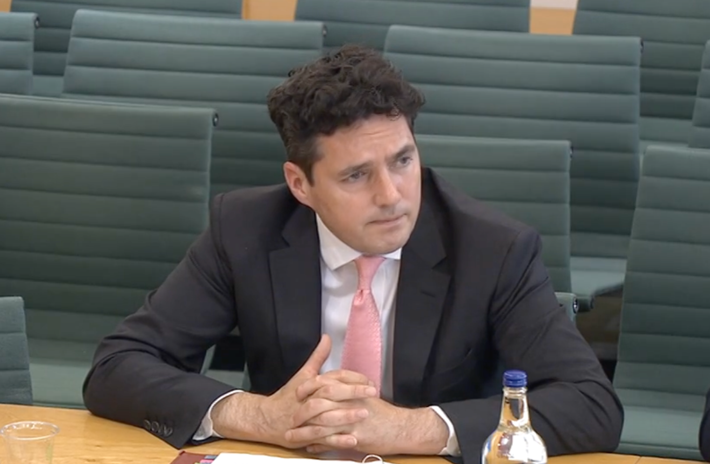 Huw Merriman, the rail minister, appearing at the transport select committee