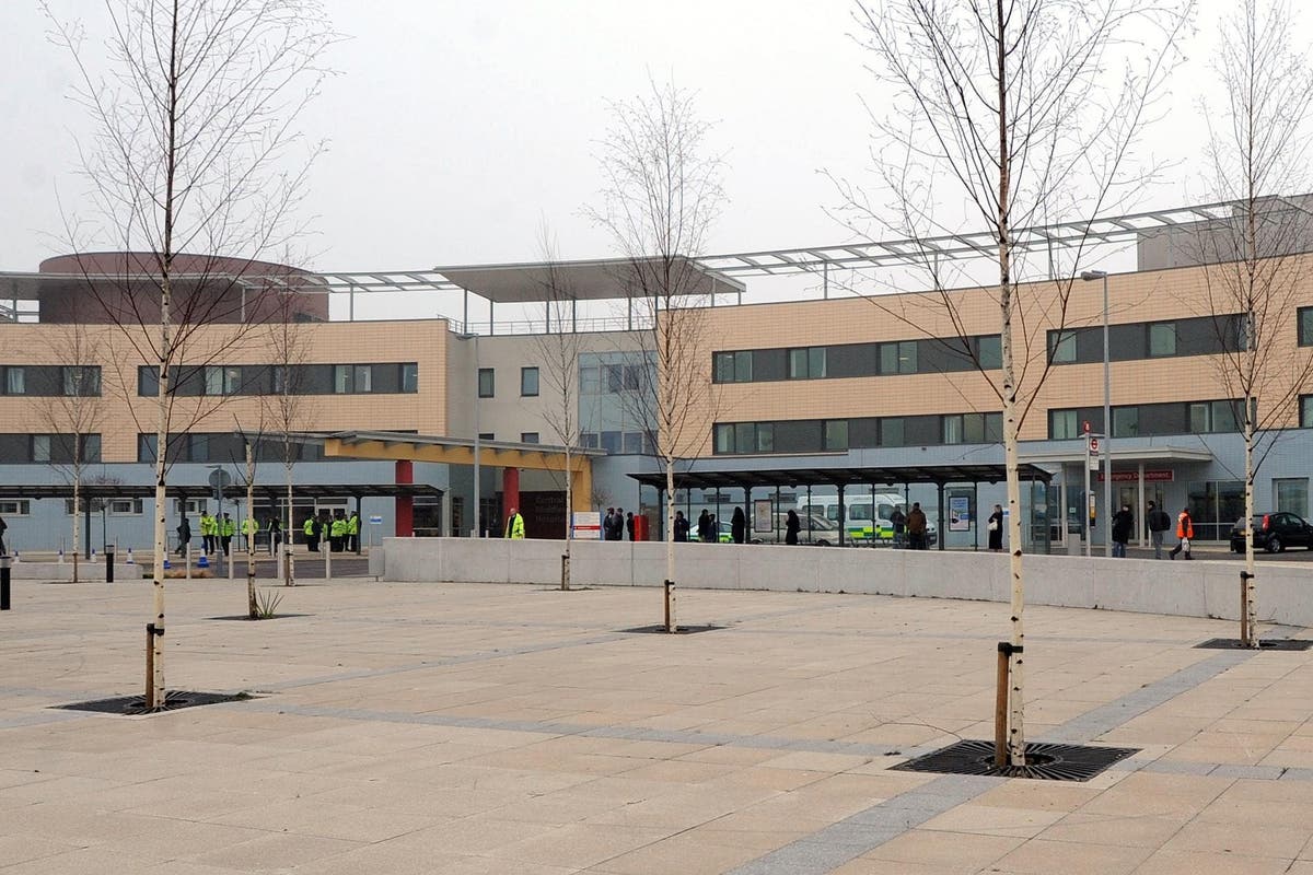 Man arrested after two people stabbed at hospital