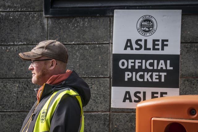 Members of the Aslef union on a picket line near to Leeds train station. The Bill would allow ministers to impose minimum levels of service during industrial action for essential services, including rail (Danny Lawson/PA)