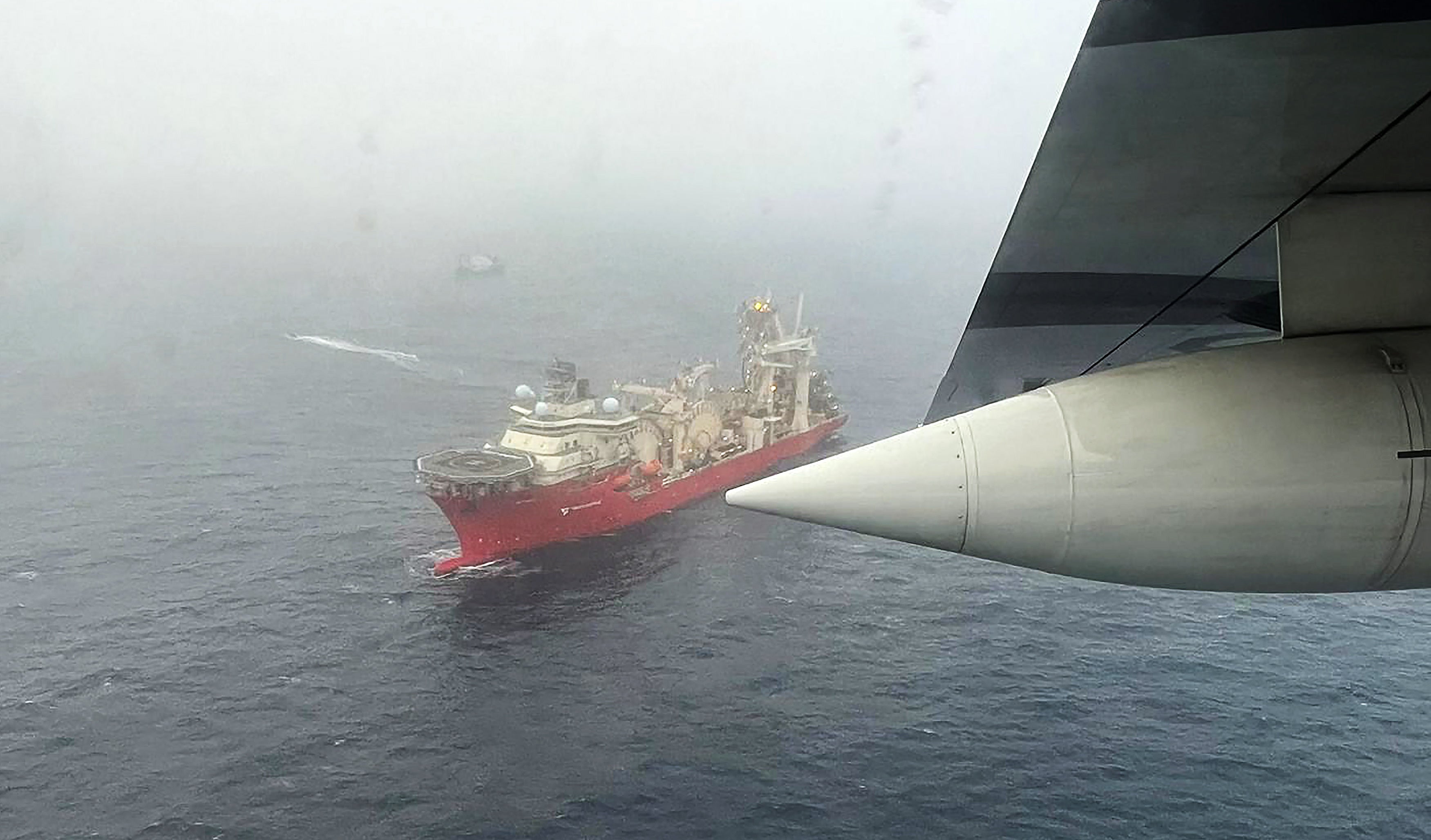 <p> A handout photo made released by the US Coast Guard showing the Bahamanian research vessel 'Deep Energy' on site during the ongoing search for the 21-foot submersible Titan, in Boston, Massachusetts, USA, 21 June 2023. </p>