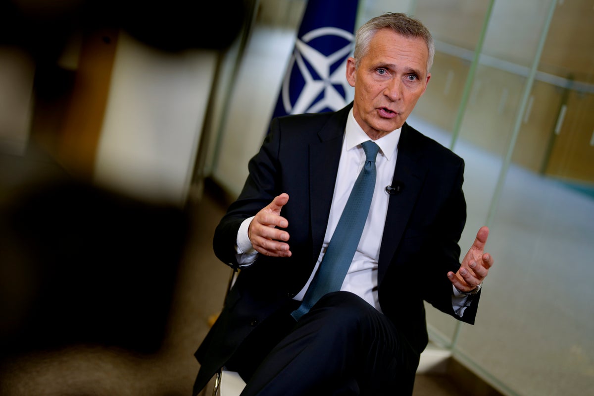 NATO wants to fight climate change. Its chief tells AP the trick is to make armies green but strong