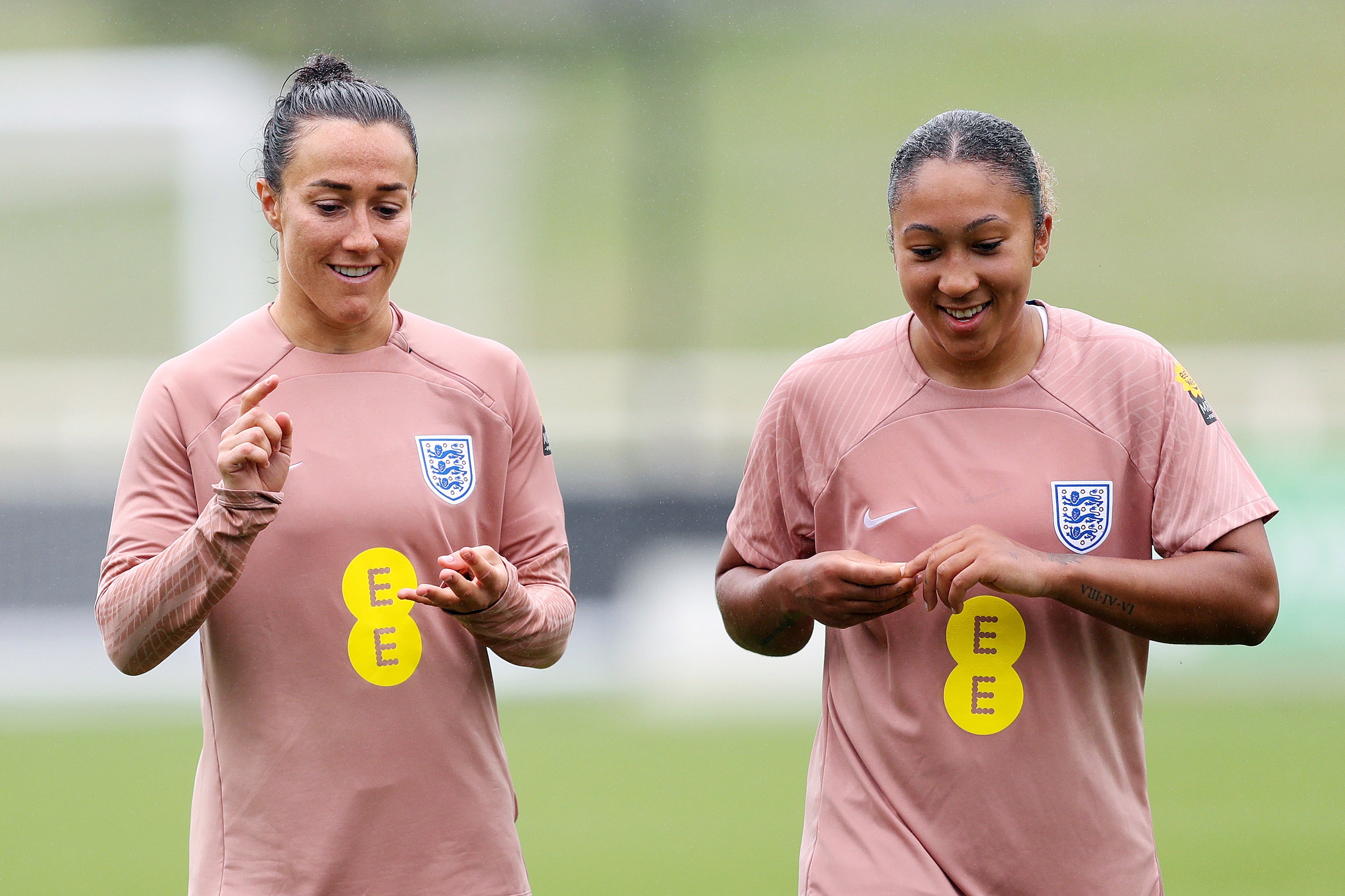 Lucy Bronze and Lauren James of England interact during a training session at St Georges Park
