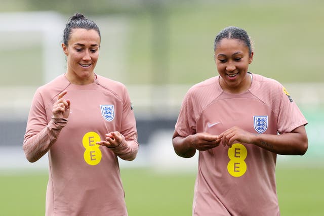 <p>Lucy Bronze and Lauren James of England interact during a training session at St Georges Park</p>