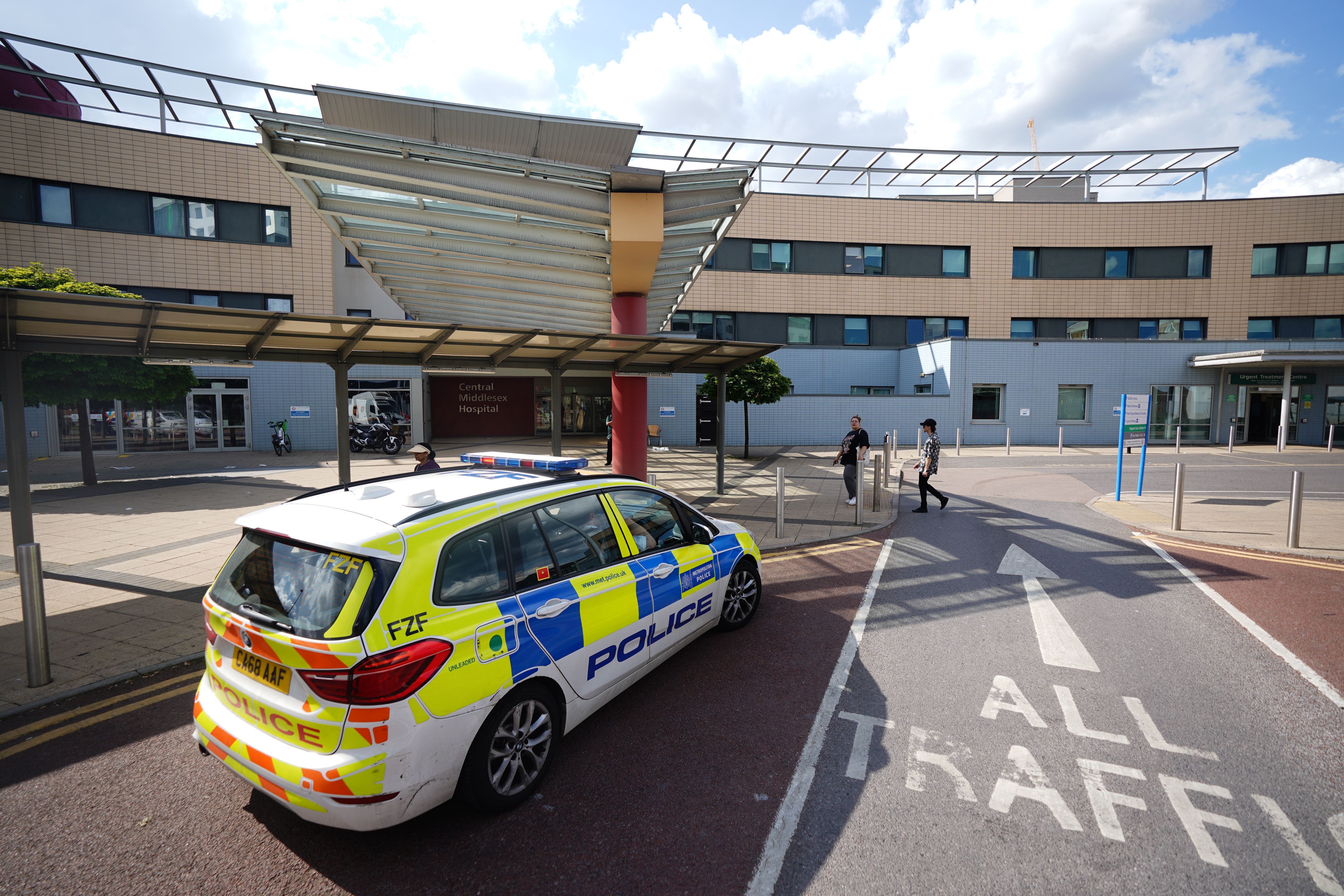 Police at Central Middlesex Hospital in north-west London after two people were stabbed (James Manning/PA)