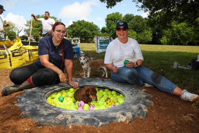 Lottery winner Zoe Hoare, right, was among the lottery-winning volunteers giving up their time (Martin Bennett/National Lottery/PA)