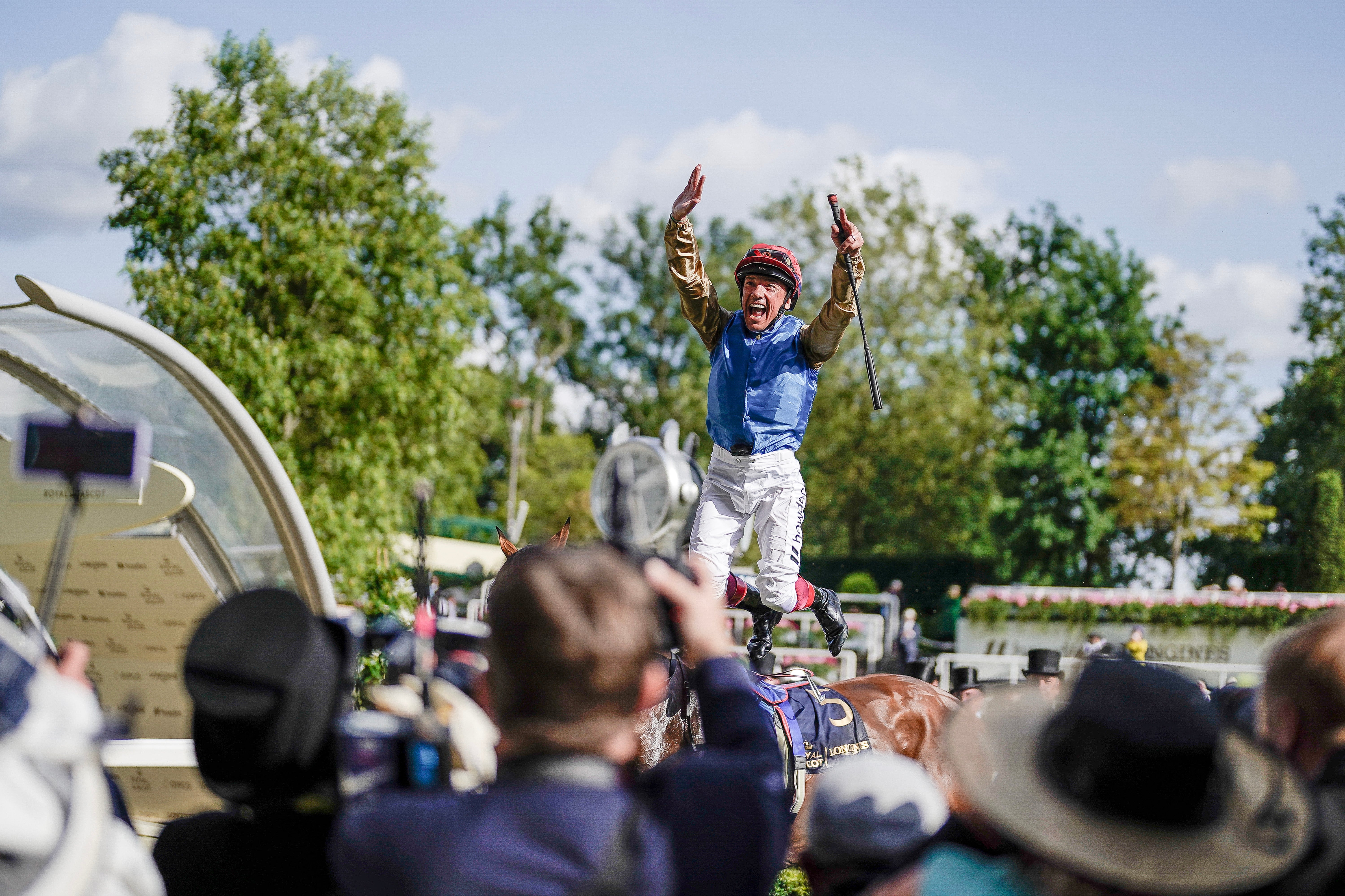 Frankie Dettori leaps in the winners enclosure after riding Gregory to win The Queen's Vase on day two