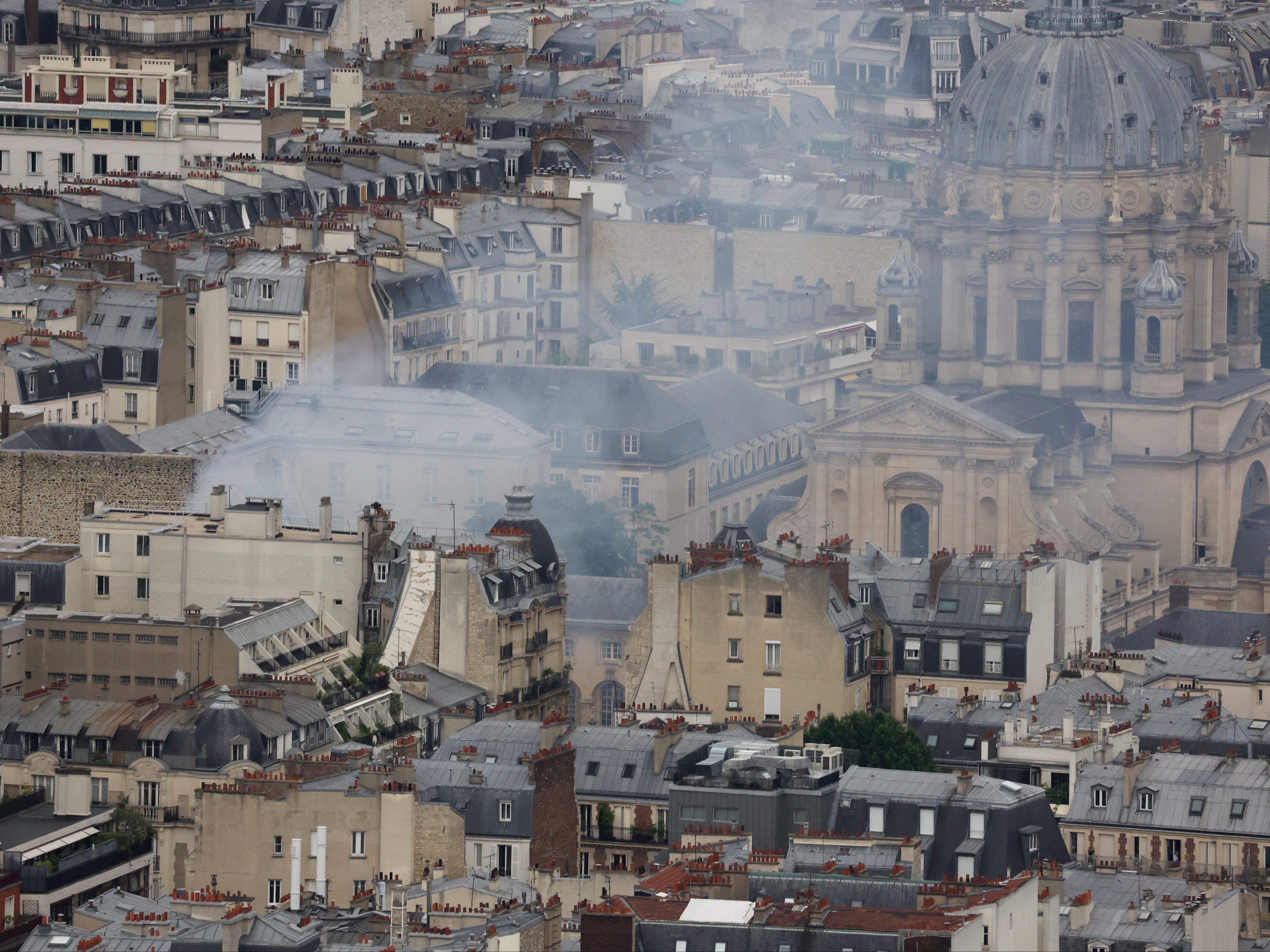 Smoke from the building billows over Paris
