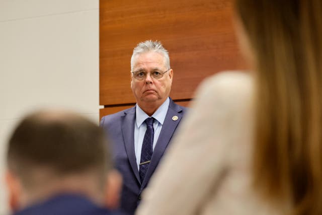<p>Former Marjory Stoneman Douglas High School School Resource Officer Scot Peterson stands behind the defense table during his trial at the Broward County Courthouse in Fort Lauderdale, Fla., on Wednesday, June 21, 2023. (Amy Beth Bennett/South Florida Sun-Sentinel via AP, Pool)</p>
