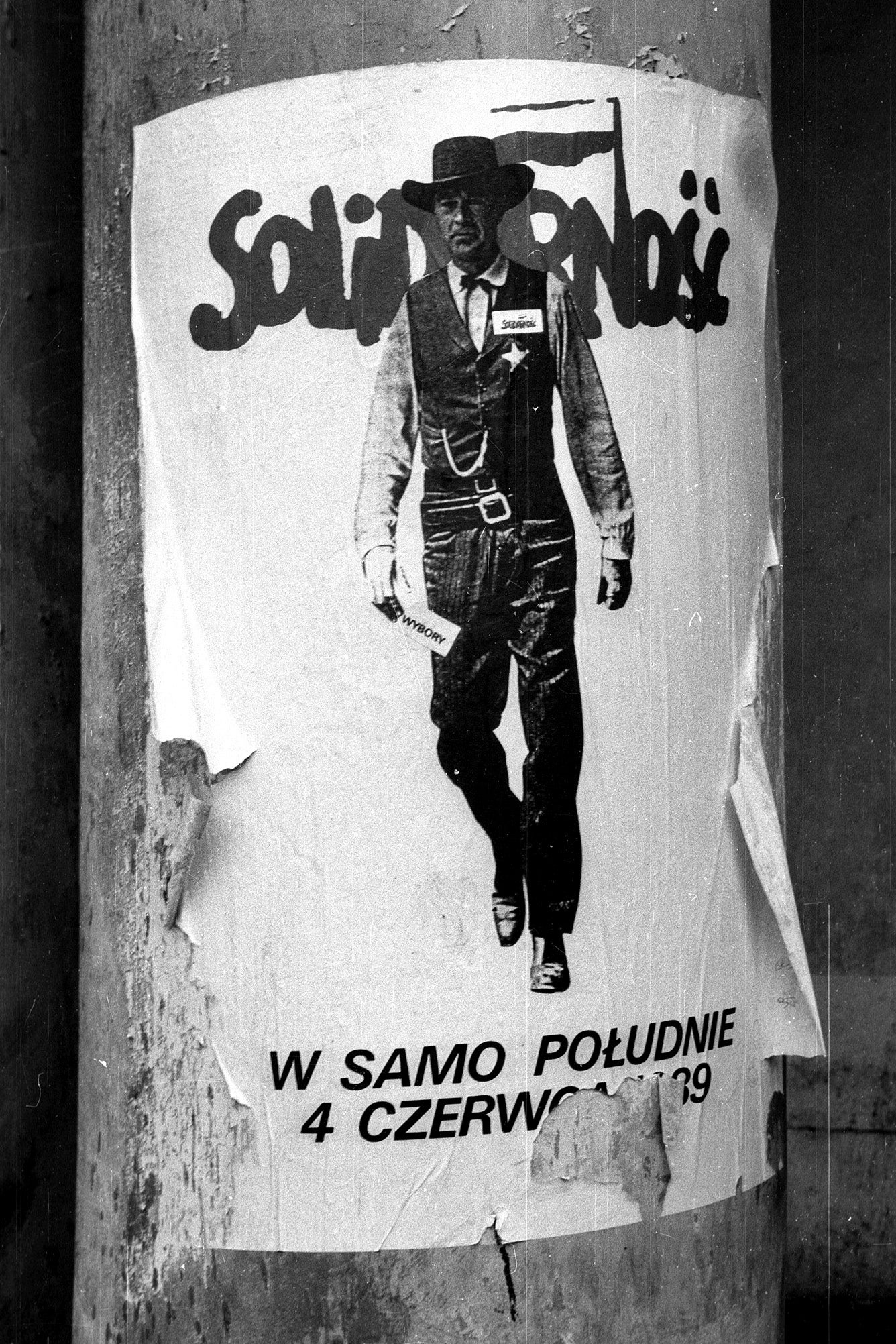 A poster for an event of Poland’s Solidarity movement in 1989, in Warsaw, featuring Gary Cooper’s character from ‘High Noon’