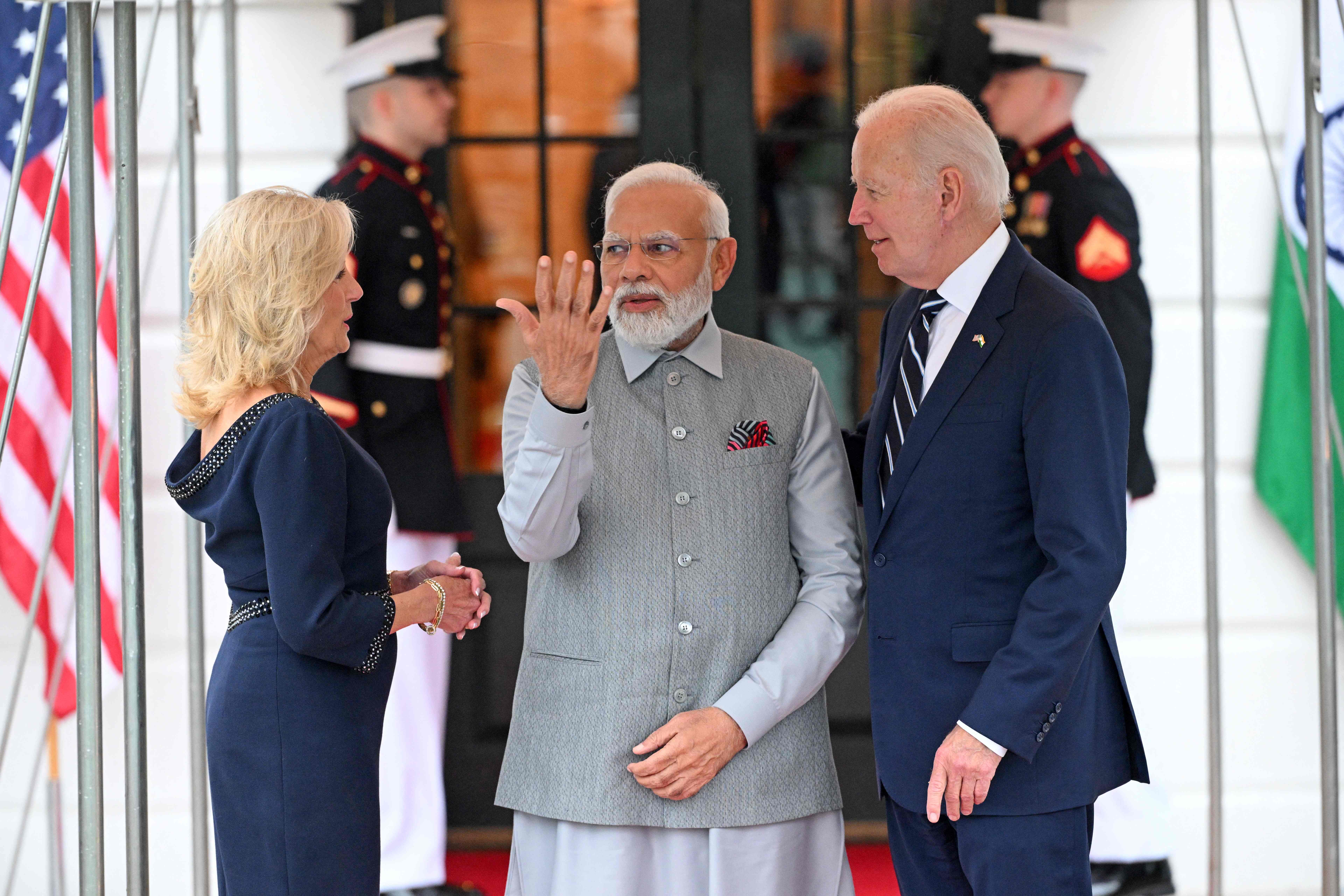 US President Joe Biden (R) and First Lady Jill Biden (L) greet India’s Prime Minister Narendra Modi as he arrives at the South Portico of the White House