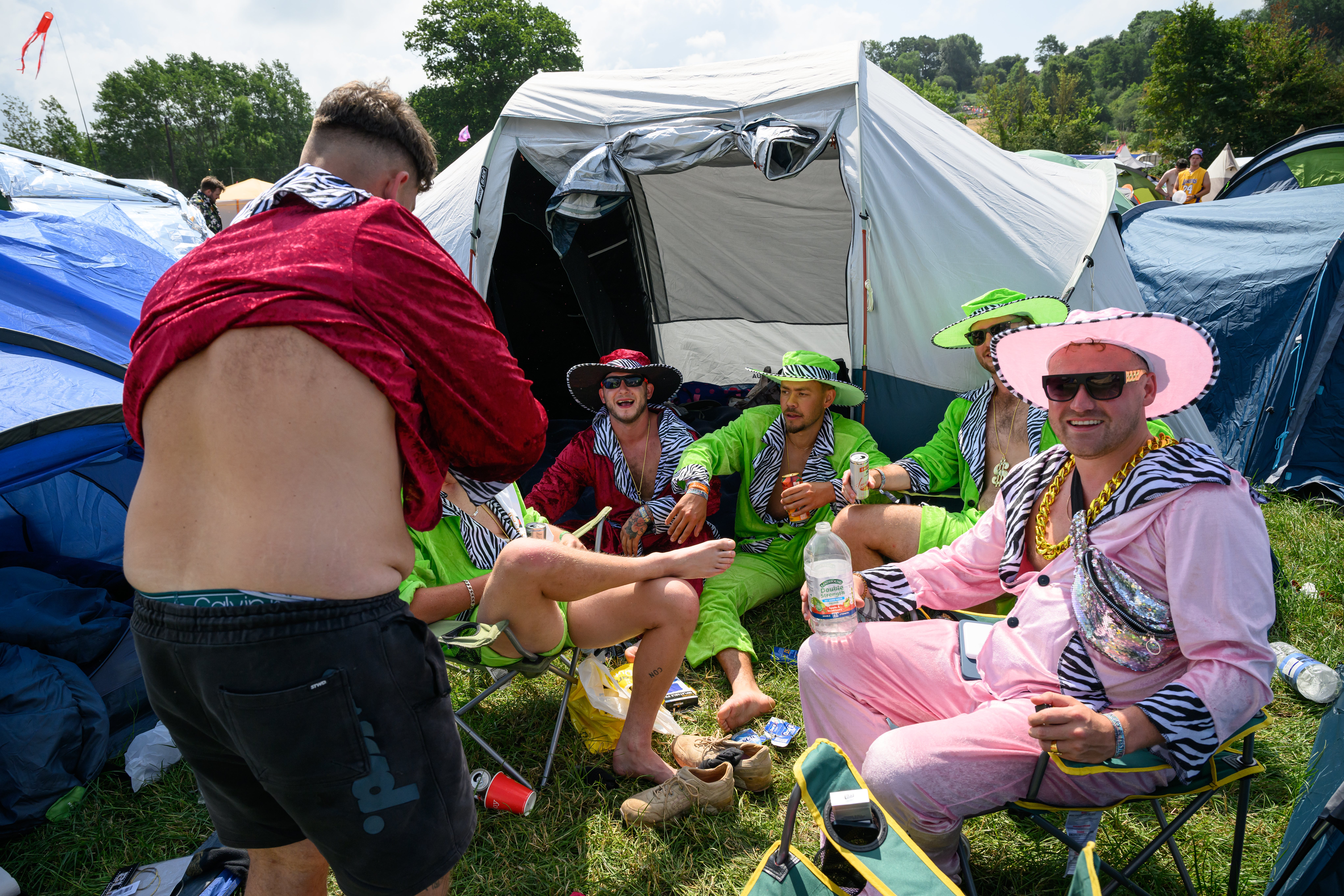 Festival-goers wear matching costumes at the start of day two of Glastonbury Festival 2023 on June 22, 2023