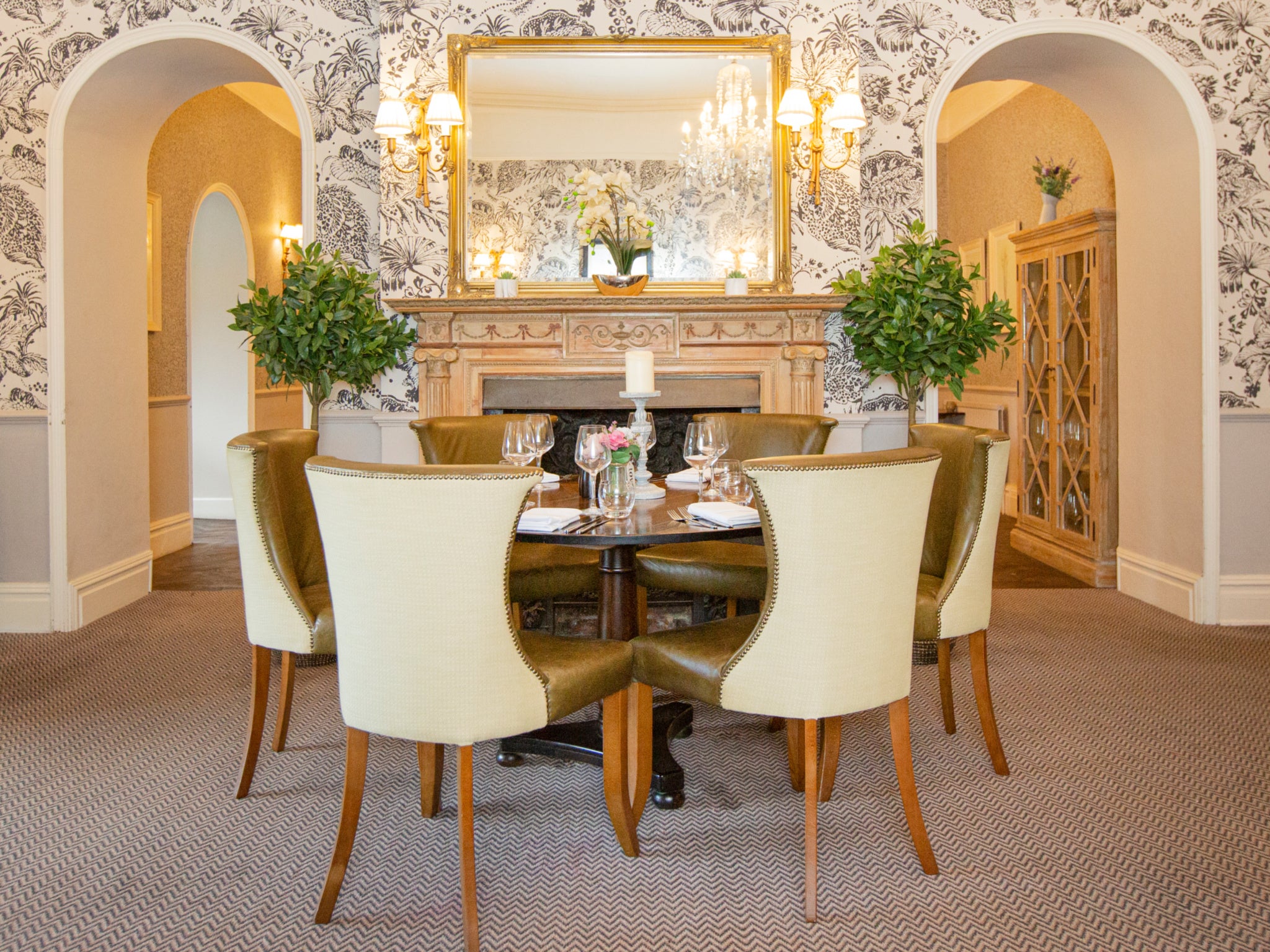 A handsome restaurant adds to the indulgent vibes at Stratton House Hotel