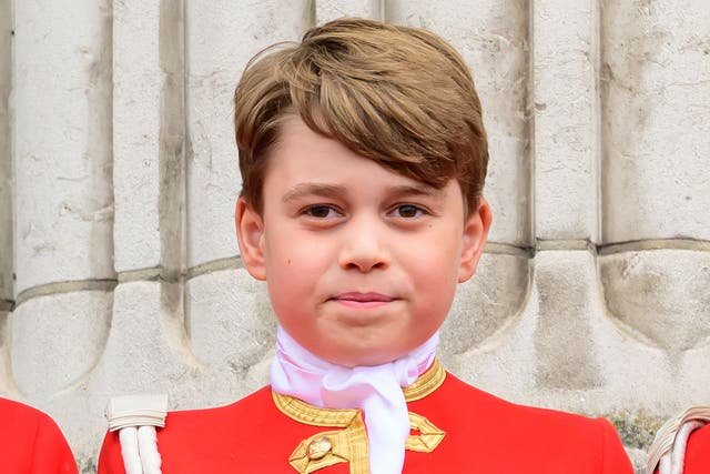 <p>Prince George on the balcony of Buckingham Palace, London (Leon Neal/PA)</p>