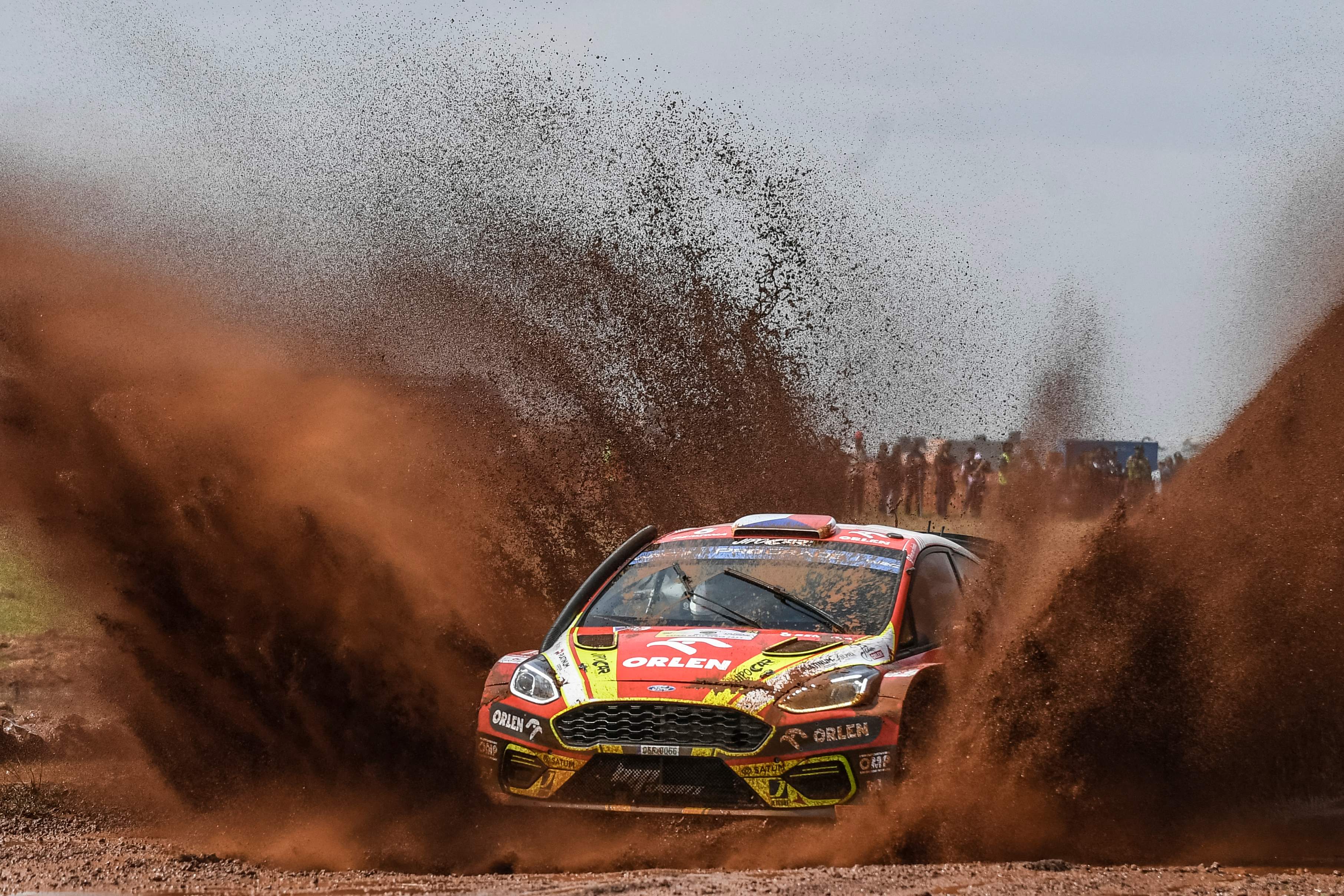 Czech driver Martin Prokop makes a splash with his Ford Fiesta MKII during the Super Special Stage at Kasarani in Nairobi