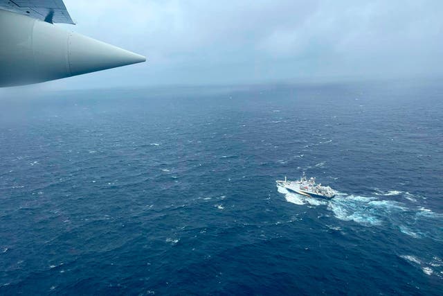 <p>A Coast Guard Hercules airplane flies over the French research vessel, L’Atalante during the search for the Titan submersible </p>